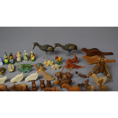 46 - A Collection of Various Miniature Carved Wooden Animals