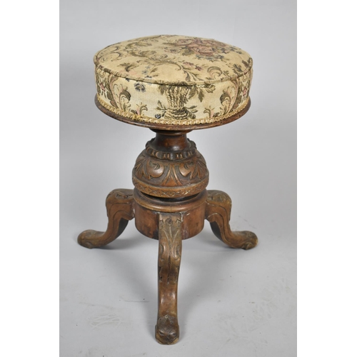 134 - A Late Victorian Swivel Piano Stool on Tripod Support with Tapestry Upholstery, 32cm Diameter