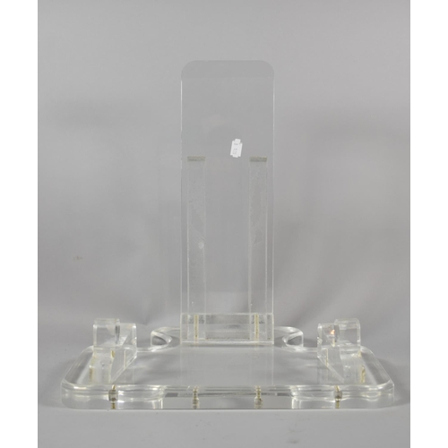 145 - A Large Heavy Perspex Charger Stand, 37cm Wide