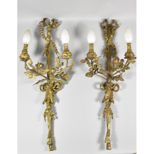 173 - A Pair of Brass Two Branch Wall Hanging Light Fittings with Floral and Ribbon Decoration,  Each 54cm... 