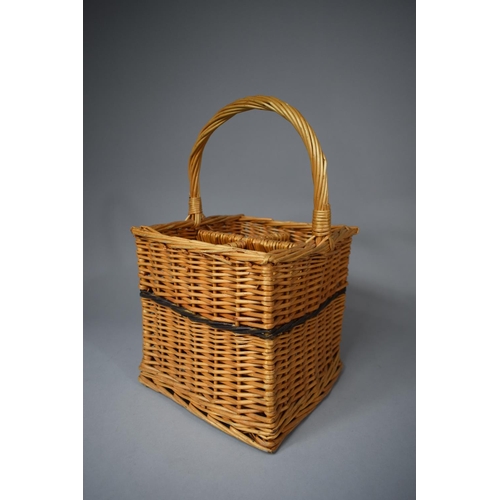 77 - A Four Division Wicker Bottle Carrier, 22cm Square