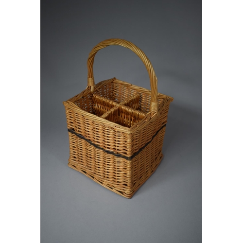 77 - A Four Division Wicker Bottle Carrier, 22cm Square