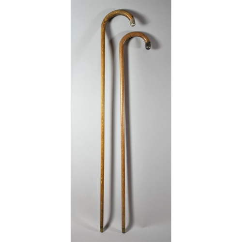 83 - Two White Metal Mounted Walking Sticks