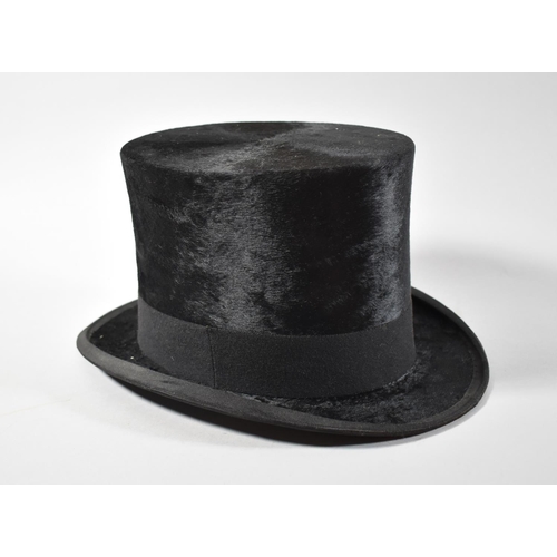 84 - A Silk Top Hat by Adamson's Hatters, Oxford, Internal Measurement 8