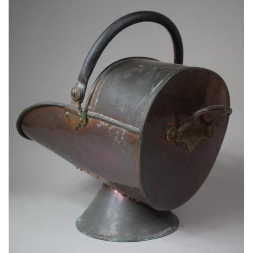 87 - A Late 19th Century Copper Helmet Shaped Coal Scuttle, 40cm Long