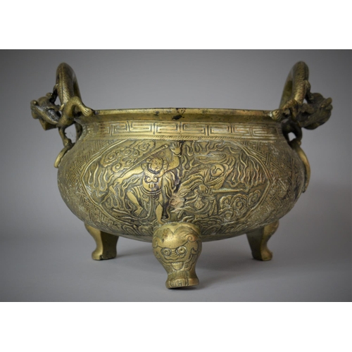 205 - A Large and Heavy Chinese Bronze Cast Censer with Twin Dragon Stylised Handles Set on Tripod Support... 