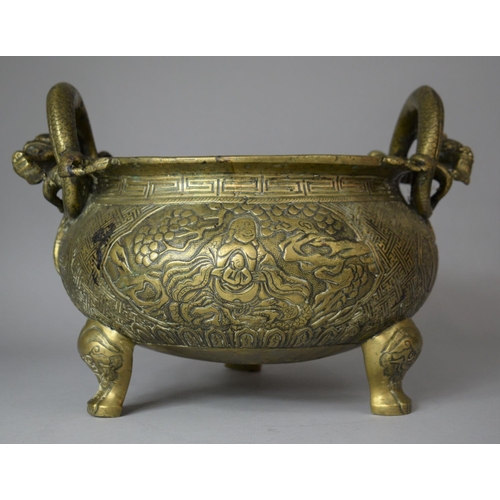 205 - A Large and Heavy Chinese Bronze Cast Censer with Twin Dragon Stylised Handles Set on Tripod Support... 