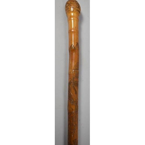 Sold at Auction: Bamboo Fishing Pole & Walking Stick