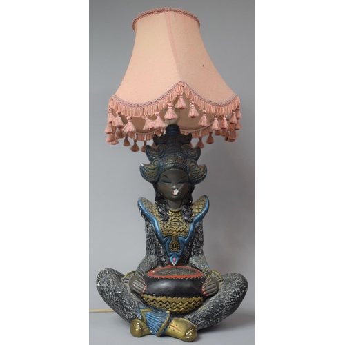 134 - A 1950's/60's Plaster Figural Table Lamp in the Form of a Seated Thai Girl, With Shade, Lamp 44cm hi... 