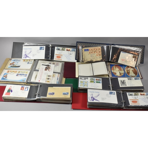 151 - A Collection of Seven Ring Binders Containing British First Day Covers