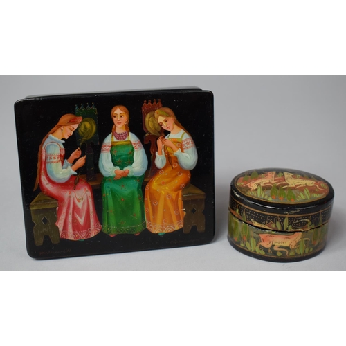 17 - A Russian Lacquered Box the Hinged Lid Decorated In Coloured Enamels Depicting Fairy Story Together ... 