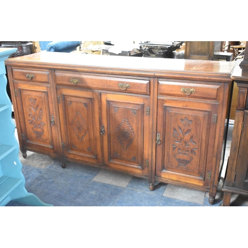 485 - An Edwardian Sideboard with Three Top Drawers Over Carved Panel Doors to Cupboard Base, 180cm wide