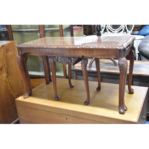 489 - A Mid 20th Century Mahogany Nest of Three Tooled Leather Topped Tables, The Longest 91cm x 45cm