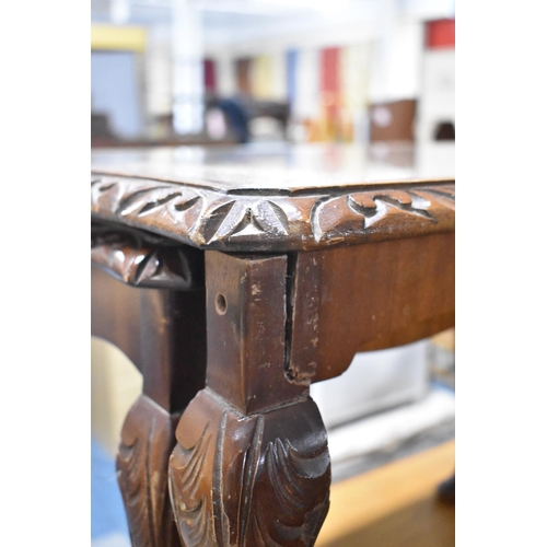 489 - A Mid 20th Century Mahogany Nest of Three Tooled Leather Topped Tables, The Longest 91cm x 45cm