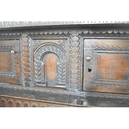 495 - An Early Carved Oak Court Cupboard the Base Section with Carved and Panel Doors to Shelved Interior,... 