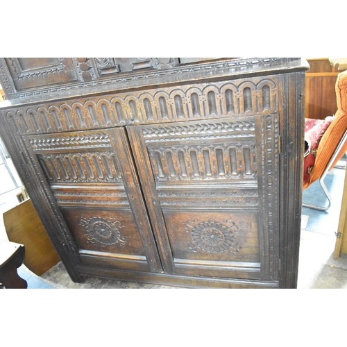 495 - An Early Carved Oak Court Cupboard the Base Section with Carved and Panel Doors to Shelved Interior,... 