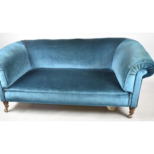 502 - A Blue Upholstered Chesterfield Settee