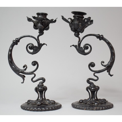 57 - A Pair of Reproduction Pressed Metal Candle Sticks in the Form of Flowers, 27cm high