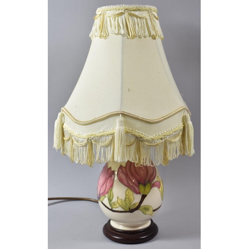 75 - A Moorcroft Vase Shaped Table Lamp, Magnolia Pattern, Lamp 27cm high, Complete with Shade