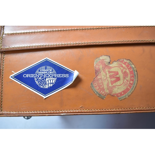 88 - A Vintage Leather Suitcase with Paper Labels to Include SS United States, 61cm wide