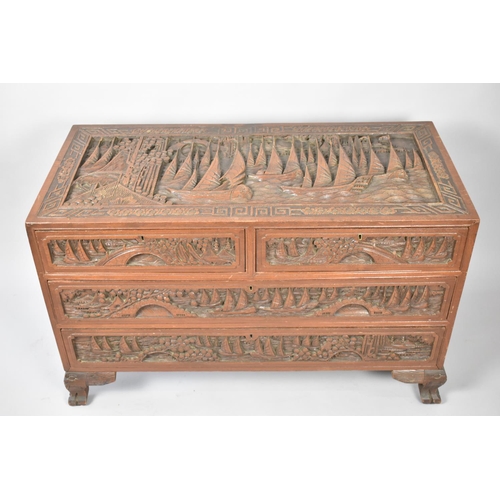 118 - A Mid 20th Century Heavily Carved Camphor Chest of Two Short and Two Long Drawers on Carved Bracket ... 