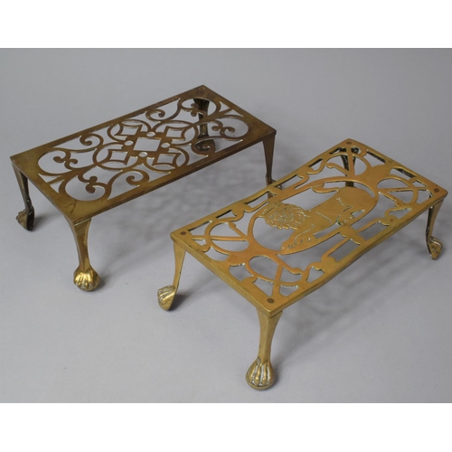 141 - Two 19th Century Pierced Brass Rectangular Trivet Stands, One with Lion Decoration, 29cm Long