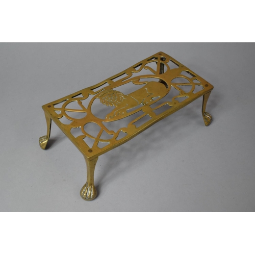 141 - Two 19th Century Pierced Brass Rectangular Trivet Stands, One with Lion Decoration, 29cm Long