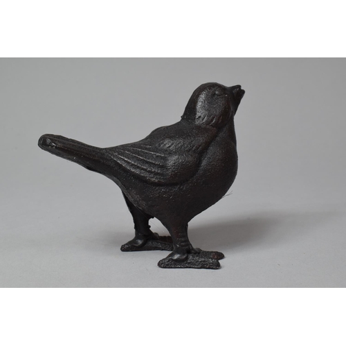 200 - A Modern Cast Iron Study of a Bird, 8.5cm high