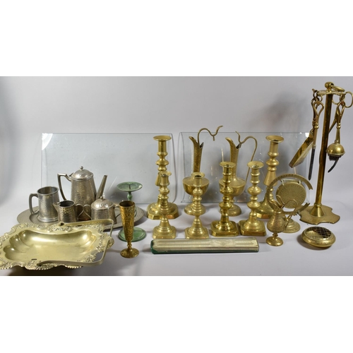 213 - A Large Collection of Metalwares to Include Brass Candle Sticks, Brass Companion Set, Indian Jugs, H... 