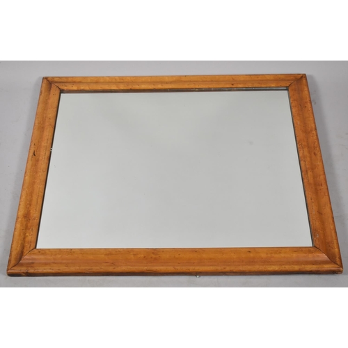 216 - A Rectangular Maple Framed Wall Mirror, 64cm x 78cm