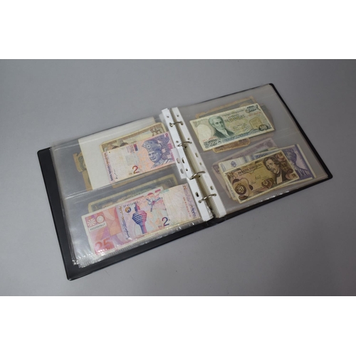 252 - An Album Containing Seventy Two World Banknotes