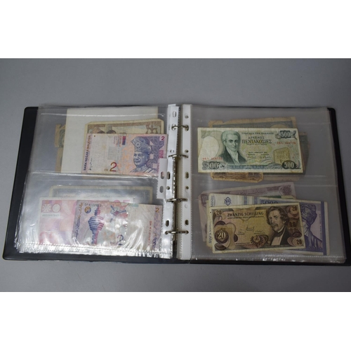 252 - An Album Containing Seventy Two World Banknotes