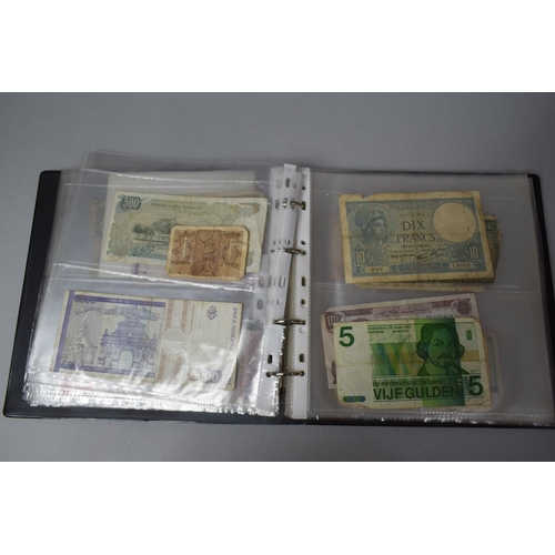 252 - An Album Containing Seventy Two World Banknotes