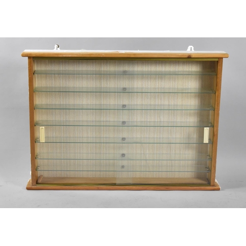 538 - A Wall Hanging Pine Framed Model Display Cabinet with Glass Sliding Doors and Seven Glass Shelves, 8... 