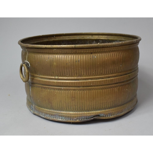 542 - A Circular Two Handled Brass Planter, 30cm diameter