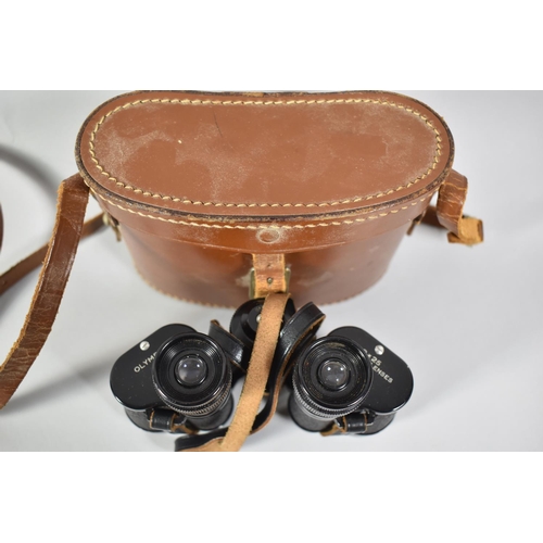 85 - A Leather Cased Pair of Vintage Olympian 8x25 Binoculars