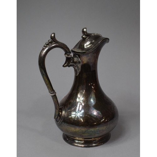 89 - An Edwardian Silver Plated Hot Water Jug with Hinged Lid, 23cm high