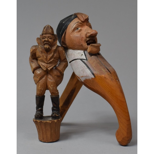 121 - A Carved Wooden Black Forest Wine Saver Cork, Together with a Nutcracker