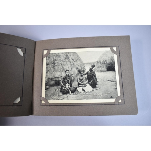 130 - A Small Snapshots Photograph Album Containing Black and White Photos of Africa and Native Life