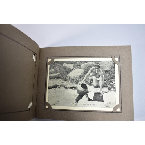 130 - A Small Snapshots Photograph Album Containing Black and White Photos of Africa and Native Life