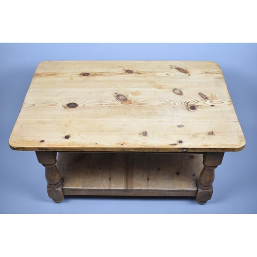 166 - A Modern Pine Rectangular Coffee Table with Stretcher Shelf and Turned Support, 92cm Wide