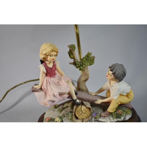 181 - A Late 20th Century Capodimonte Figural Table Lamp, Children on Seesaw