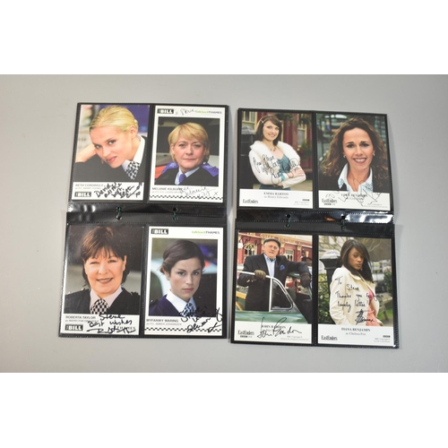 219 - A Collection of Autographed Photographs from TV Series Eastenders and The Bill