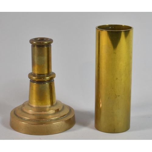 269 - A Small Brass Cylinder and a Stepped Candlestick