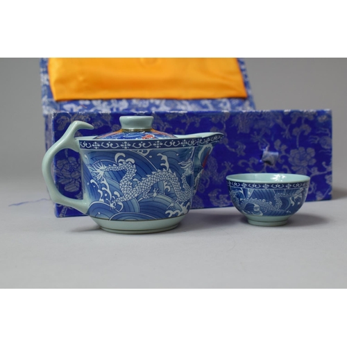 289 - A Late 20th Century Cased Chinese Teaset Comprising Blue and White Teapot and Six Tea Bowls