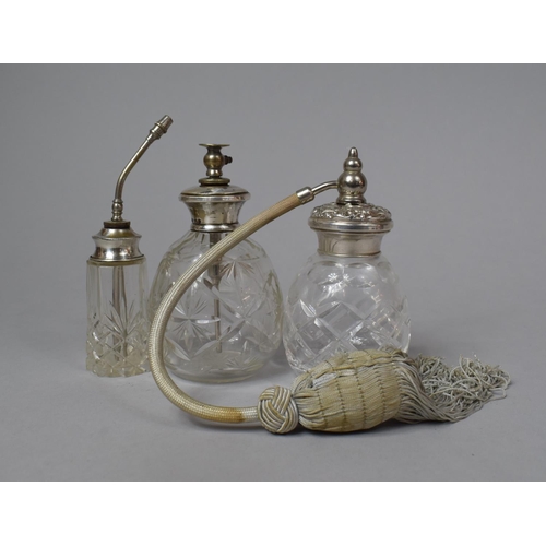 459 - A Collection of Three Silver Topped Glass Atomiser Bottles