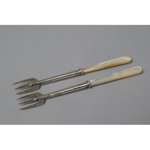 469 - A Pair of Mother of Pearl Handled Silver Forks by Adie and Norkin 1922, 11cm Long