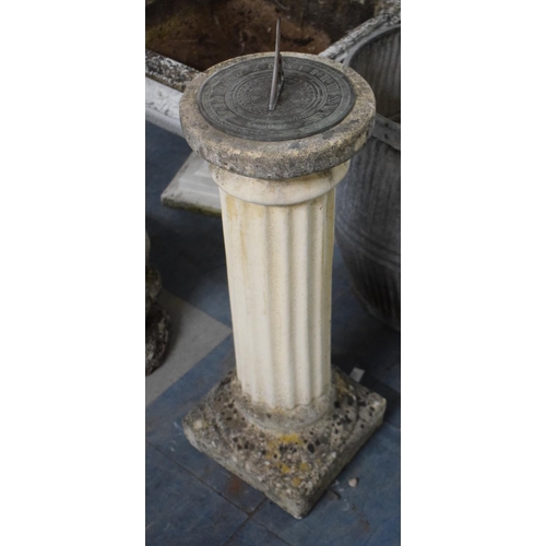 550 - A Reconstituted Stone Garden Sundial of Ribbed Column Form, 75cm high