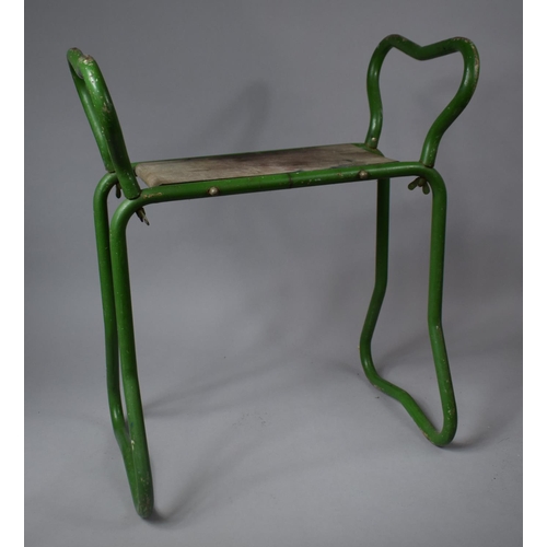 557 - A Green Painted Metal Framed Gardener's Seat, 56cm wide