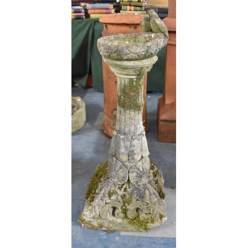 587 - A Reconstituted Stone Garden Bird Bath on Square Supports, 85cm high